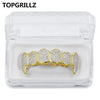 مجموعة أسنان ذهبية صلبة (Grillz)