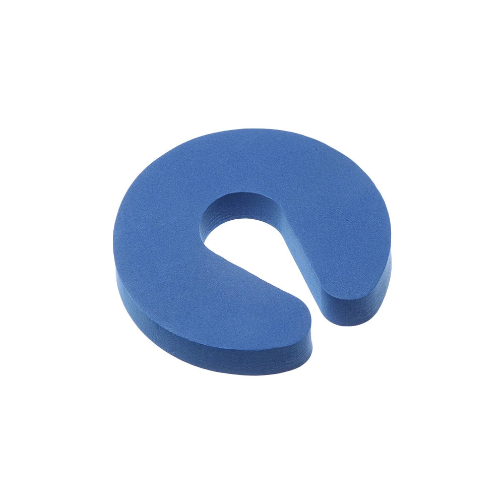 A blue foam door stopper with a finger pinch protection design.