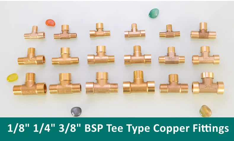 A collection of brass BSP tee type copper fittings in various sizes, including 1/8", 1/4", 3/8" pipe fittings.