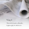 Roll of thin, soft, seamless, durable, lightweight, non-reflective photo backdrop material
