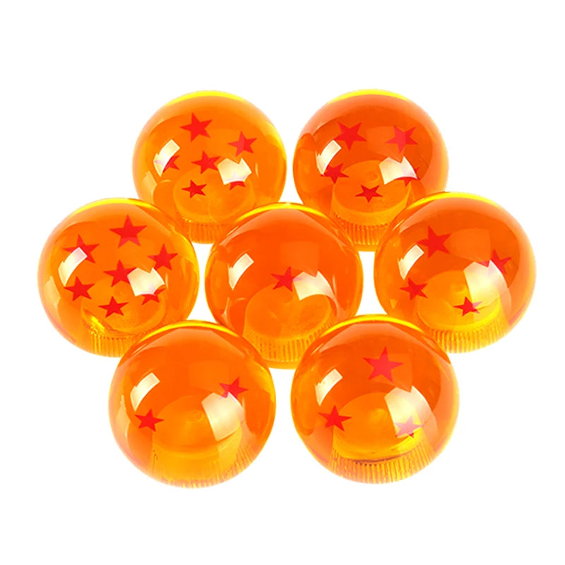 Five glossy orange shift knobs with a star design arranged in a pyramid.