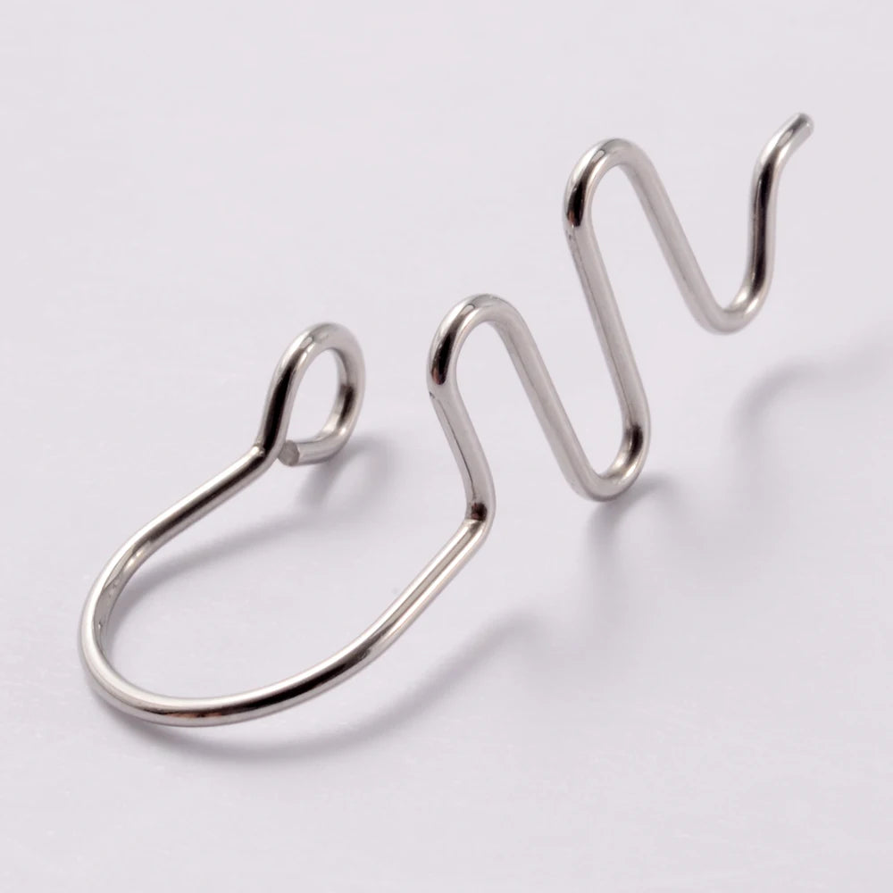 A silver spiral non-piercing nose ring made of surgical steel