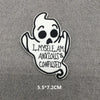 A white embroidered patch shaped like a ghost with text that reads I myself am anxious & confused.