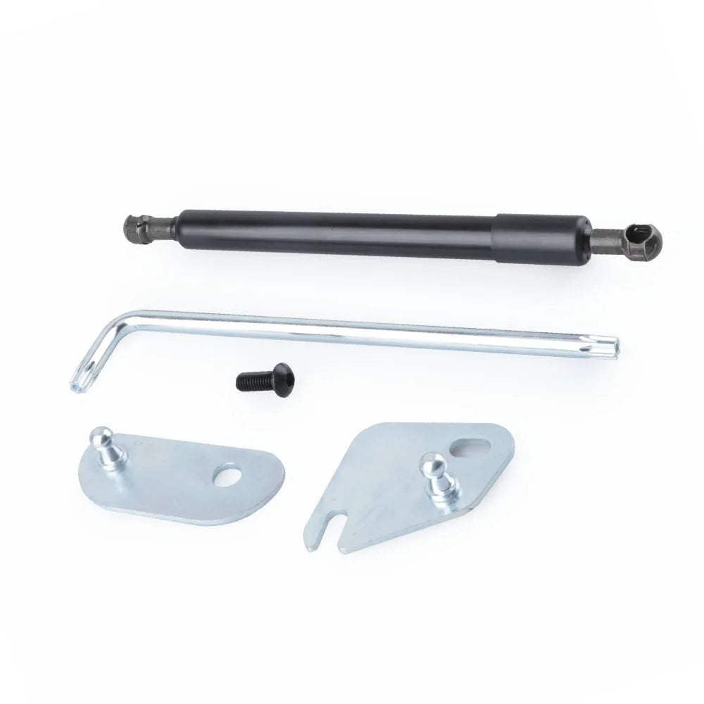 A set of gas spring tailgate struts for a Ford F-150, including a long cylindrical strut and mounting hardware.