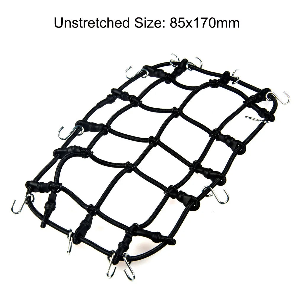 Black wire mesh RC crawler decoration set including a shovel, fire extinguisher, and oil drum