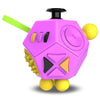 A pink 12-sided fidget cube with a green stick, yellow accents, and textured sides.