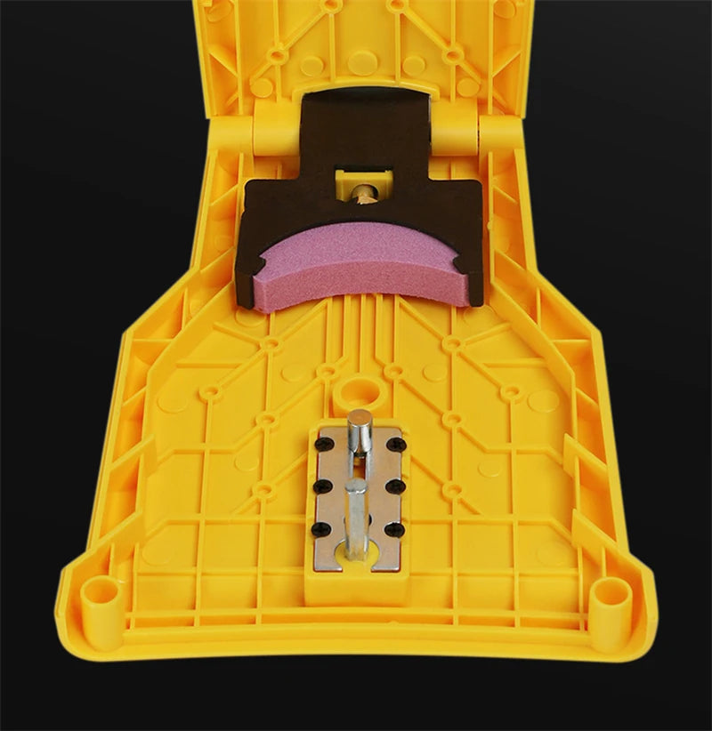 A yellow portable chainsaw sharpener tool with a black holder and purple whetstone insert.