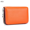 Orange genuine leather card holder with a zipper and RFID protection feature