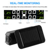 A black solar-powered tire pressure monitoring system with an LCD display showing real-time tire pressure and temperature.