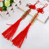 Red handmade knot with gold coins used for Chinese Feng Shui wealth