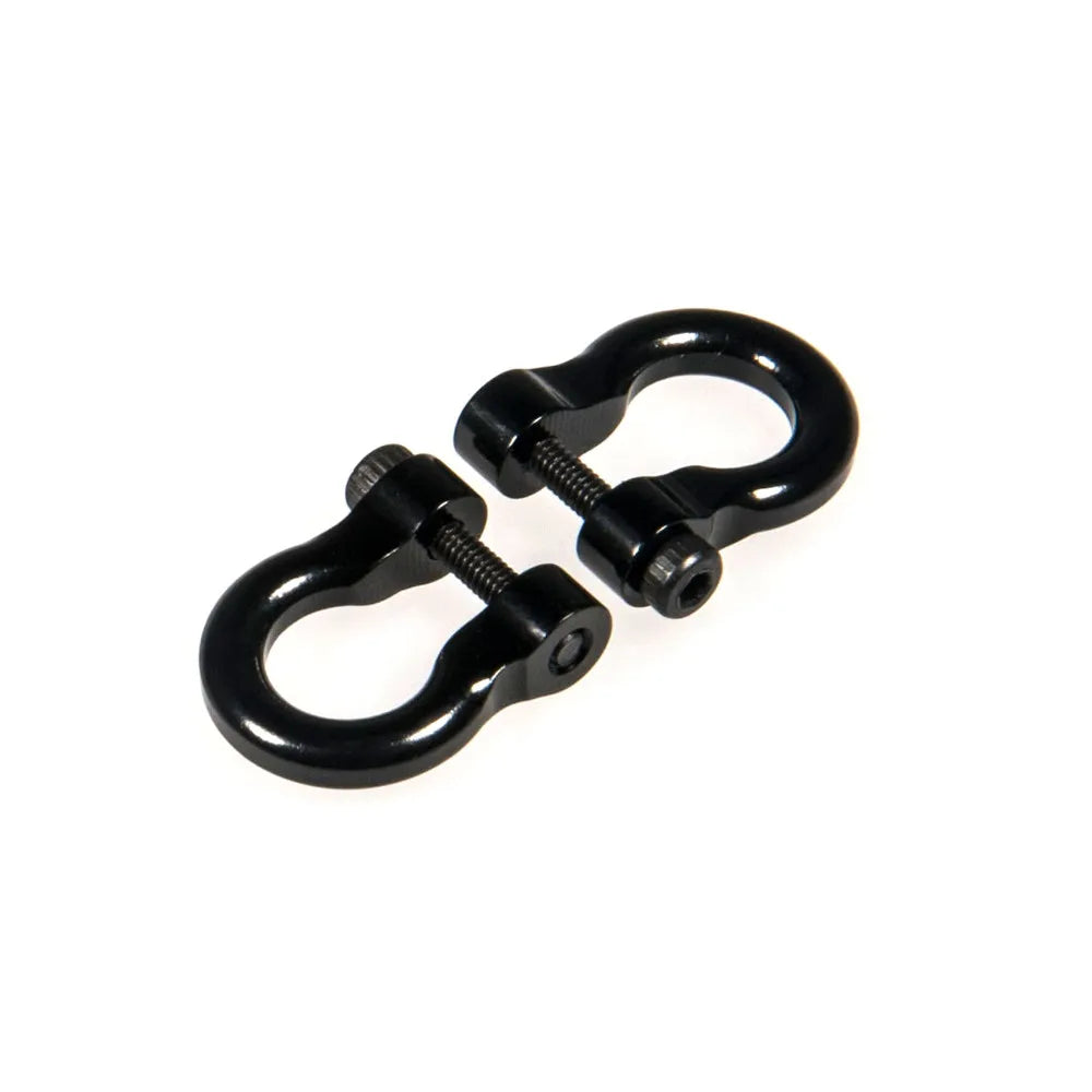 A pair of black metal alloy tow shackles for an RC crawler, packaged as a 2-pack.