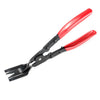 A pair of red and black trim clip removal pliers used for auto upholstery and panel work.