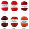 A set of red acrylic line yarn balls in various weights, including 19 to 24 skeins.