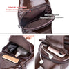 Close-up view of a brown genuine leather chest bag showing internal zip pockets and compartments.