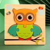 A wooden 3D owl animal puzzle set featuring orange and brown colors with small clouds surrounding the figure.