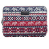 A navy blue canvas laptop sleeve featuring a repeating pattern of elephants and geometric designs.