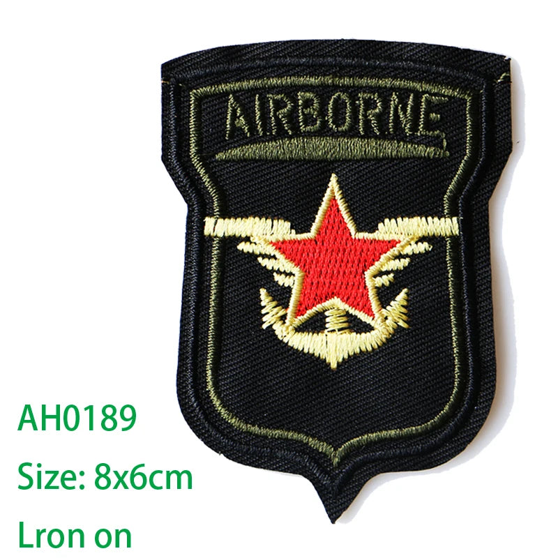 Black embroidered Airborne US Marine Corps medal patch featuring a red star and wings