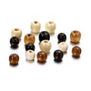 A collection of natural wooden spacer beads in various light and dark wood tones arranged on a white background.