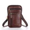 A brown vintage leather multi-pocket waist bag with a zipper and leather strap.