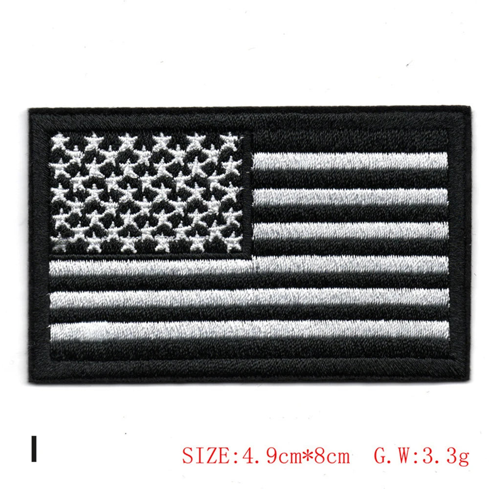 Black embroidered American flag patch featuring white stars and stripes