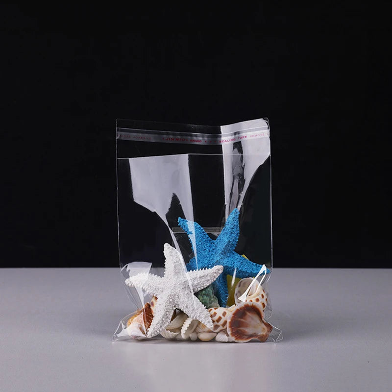 A clear resealable storage bag filled with starfish and sea shells.