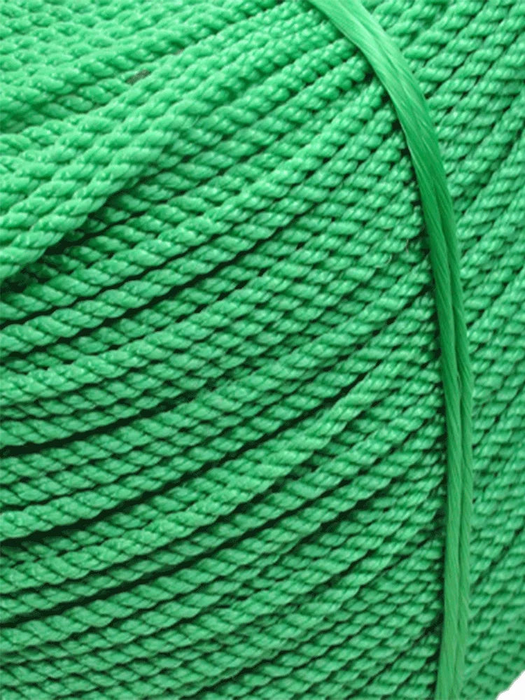 A close-up of a thick, bright green heavy-duty polyethylene rope coiled and bundled.