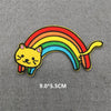 Rainbow embroidered patch featuring a yellow cat silhouette on a multicolored arc.