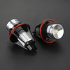 A pair of LED Angel Eyes marker light bulbs with silver and black housing and red accents.