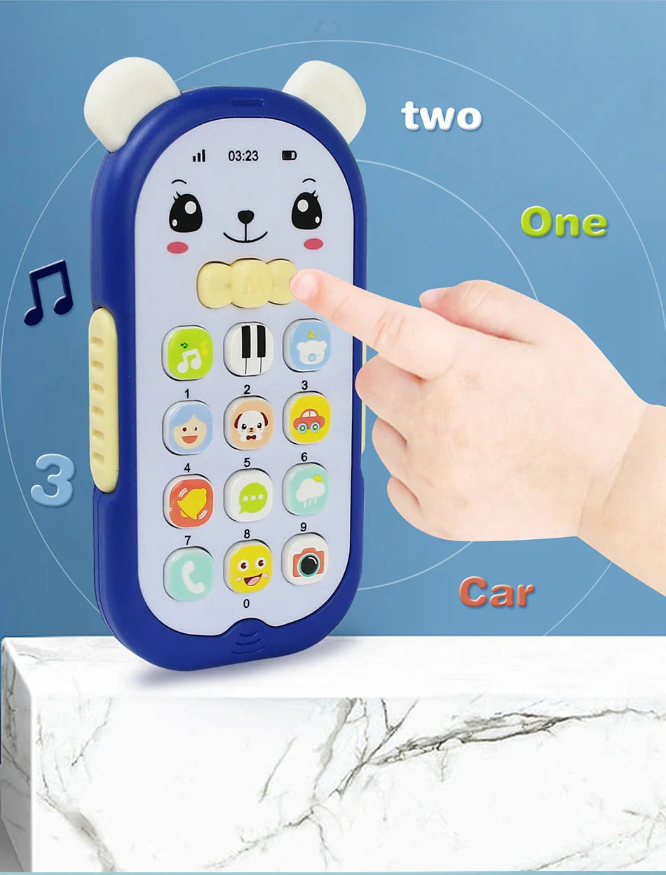 A blue musical teether phone toy shaped like a bear, showing numbers one, two, and three on the keypad.