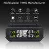A black digital tire pressure monitor device with a display showing 2.5 Bar and a battery icon.