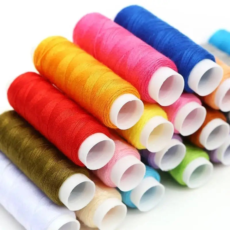 Rolls of vibrant colored thread in various shades including pink, orange, yellow, and blue.