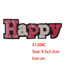 Iron-on patch featuring the word HAPPY made of pink sequins