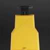 A yellow portable chainsaw sharpener with a black handle and sharpening stone.