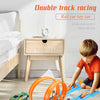 A set of double track racing toy cars on a blue track with orange loops and dual lanes.