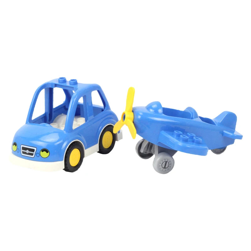 Blue city rescue vehicle building block set with traffic signs and a yellow attachment.