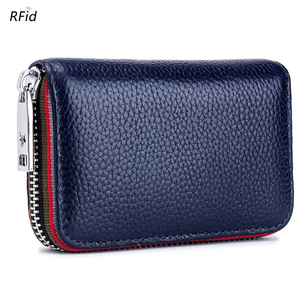 A dark blue genuine leather card holder with a zipper and RFID protection feature.