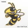 Yellow and black embroidered bee patch with wings and stripes