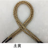 A bundle of multi-color polypropylene gift string rope tied in an 'X' shape.