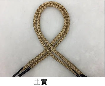 A bundle of multi-color polypropylene gift string rope tied in an 'X' shape.