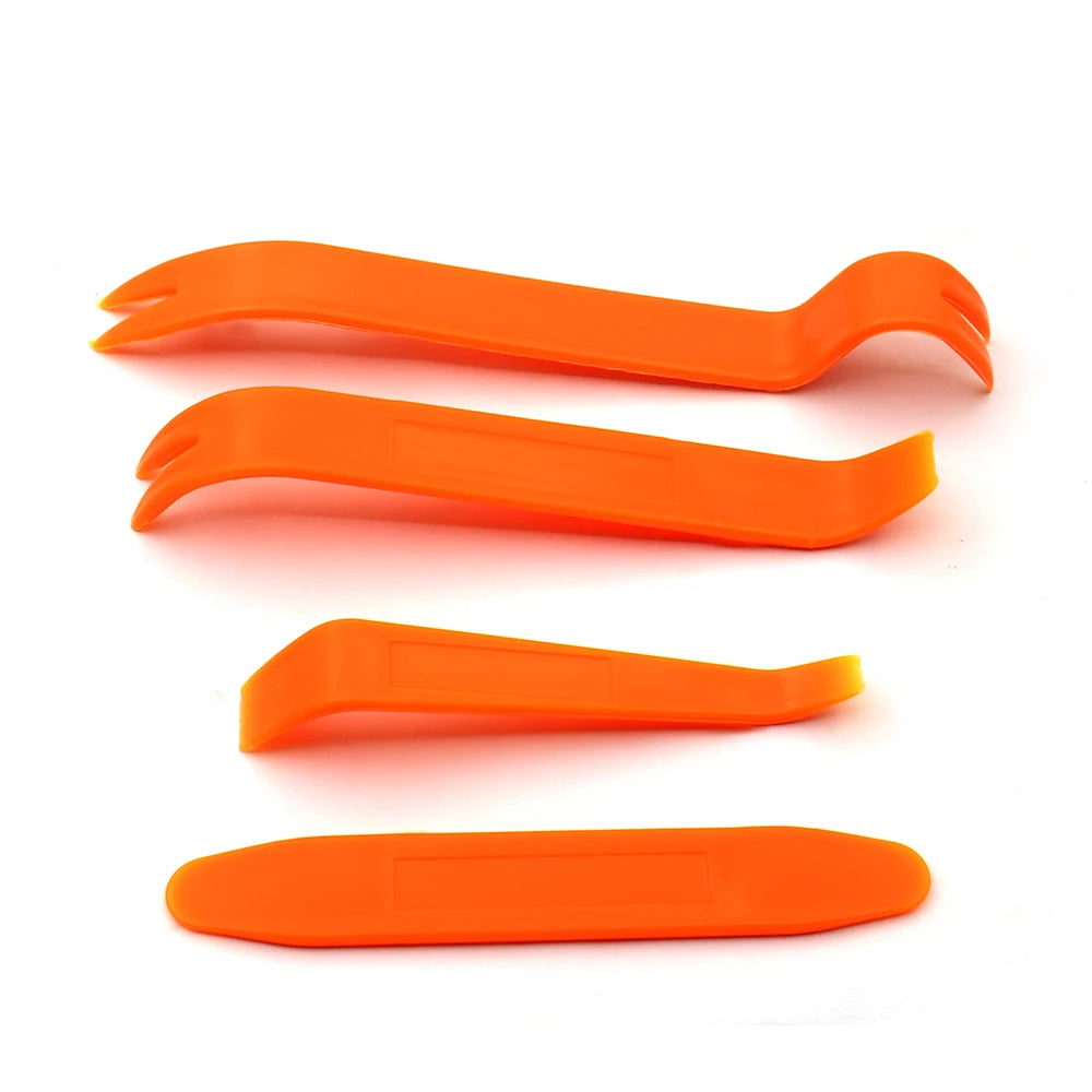 Orange trim clip removal pliers used for auto upholstery and panel work