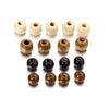 A collection of natural wooden spacer beads in various light and dark shades arranged in a row.
