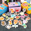A set of wooden animal and vehicle puzzles and storage boxes featuring various cute animals like cats, bears, and birds.