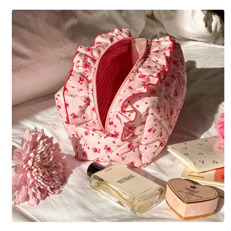 Neceser acolchado con estampado floral y lazo decorativo