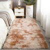 A fluffy, light brown Nordic fur rug placed in a bright room next to a wooden cabinet and a potted plant.