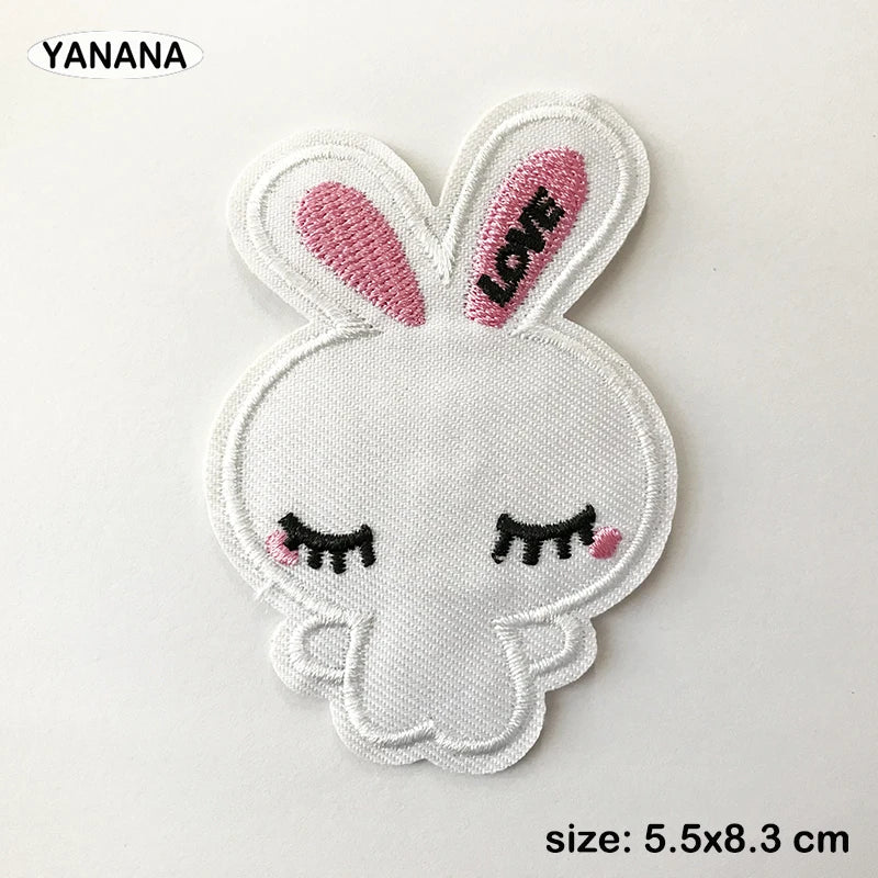 White embroidered bunny patch with pink inner ears and a black heart-shaped eye detail