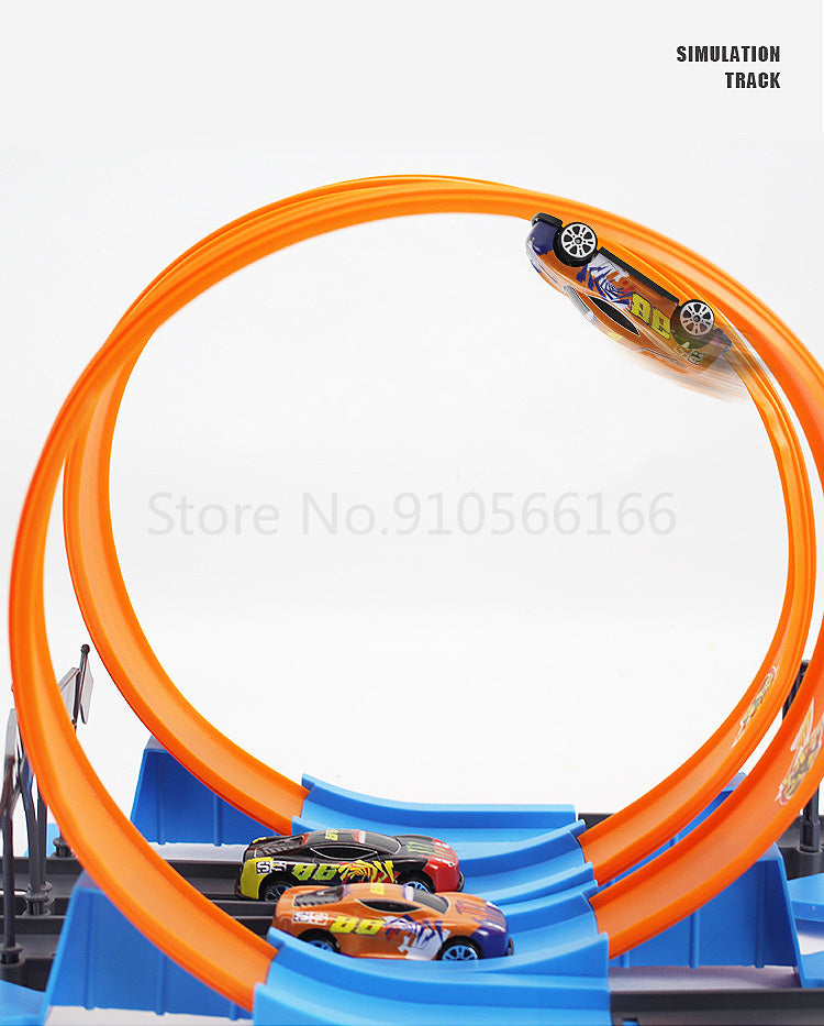 A simulation track set featuring an orange loop and dual-lane racing tracks with small cars.