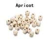A collection of natural wooden spacer beads in various sizes and shades.