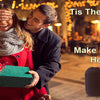 A couple smiling outdoors holding a green gift box and a black sewing kit storage bag.