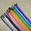 A bundle of multi-color polypropylene string rope in various shades including black, white, pink, orange, green, blue, and pu