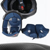 A black motorcycle helmet with a detachable blue lining and padding components shown separately.